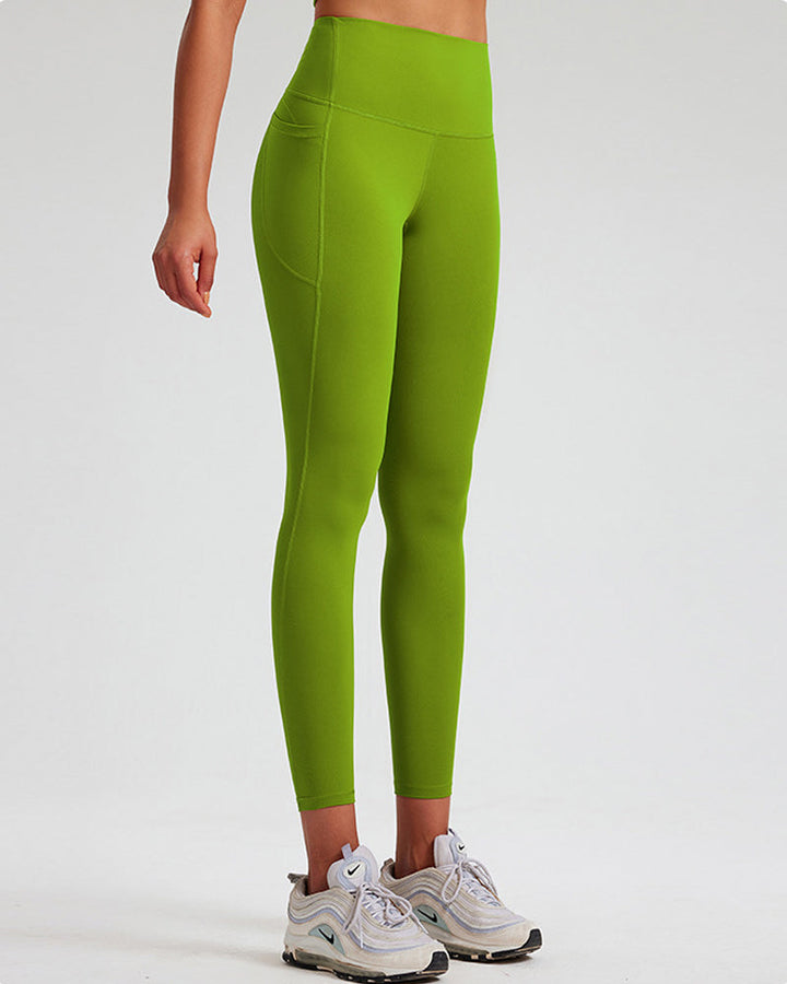 High-Waisted Tummy Control Yoga Leggings with Stretch and Side Pockets - Solid Color