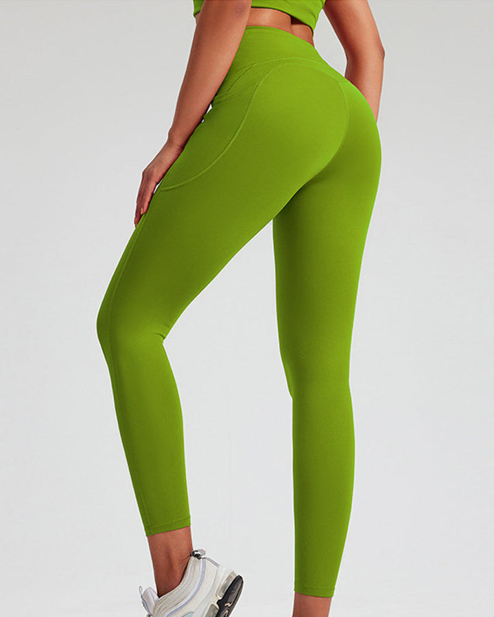 High-Waisted Yoga Leggings with Belly Control and Side Pockets