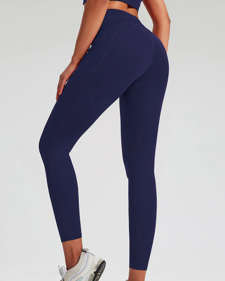 High-Waisted Tummy Control Yoga Leggings with Stretch and Side Pockets - Solid Color