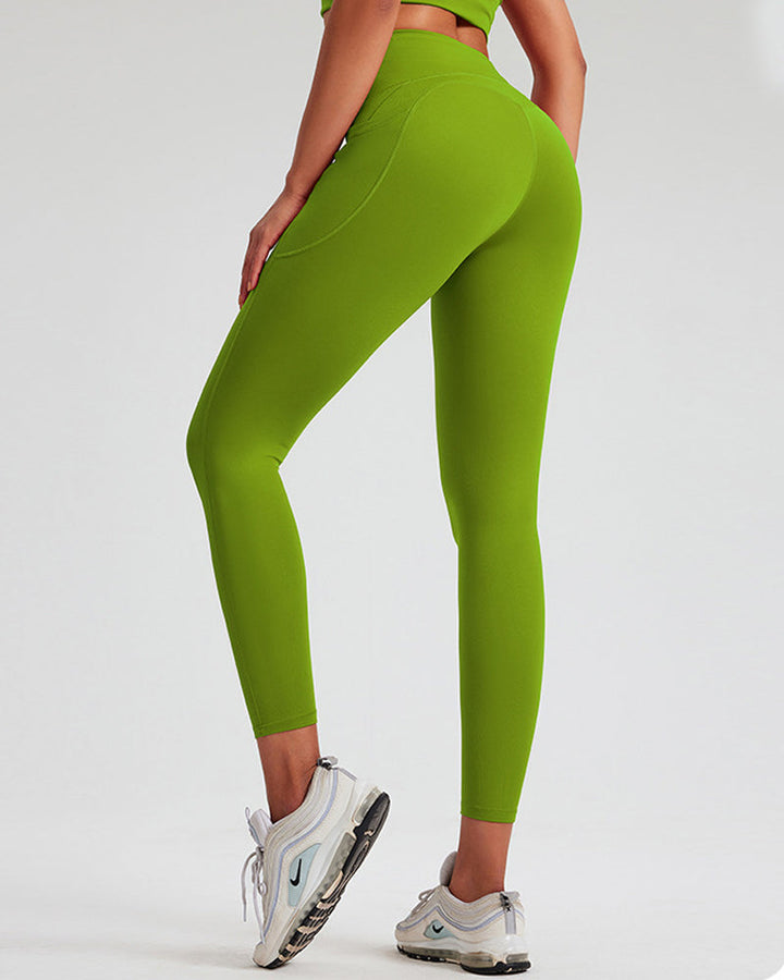 High-Waisted Tummy Control Yoga Leggings with Stretch and Side Pockets - Solid Color