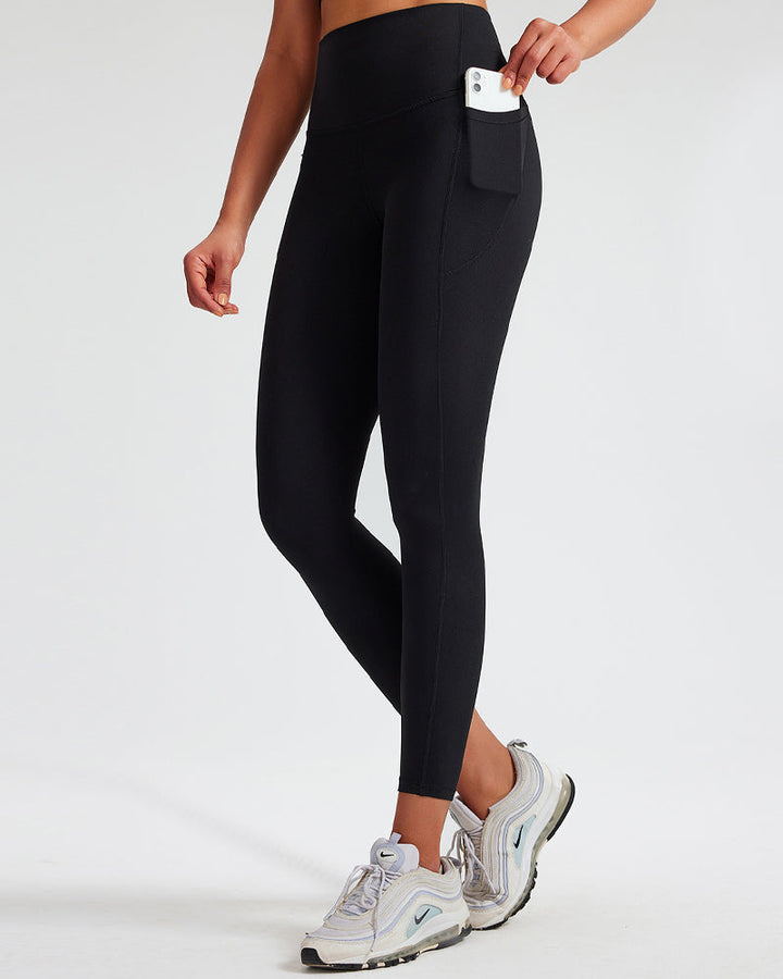 High-Waisted Tummy Control Yoga Leggings with Stretch and Side Pockets - Solid Color